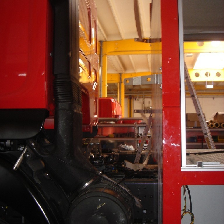 Millibil milli yfirbygginga í Árnes bifreiðinni