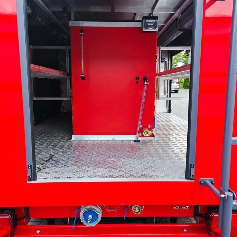 Séð inn í dæluskáp